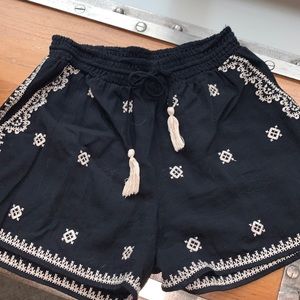 Black and cream embroidered shorts